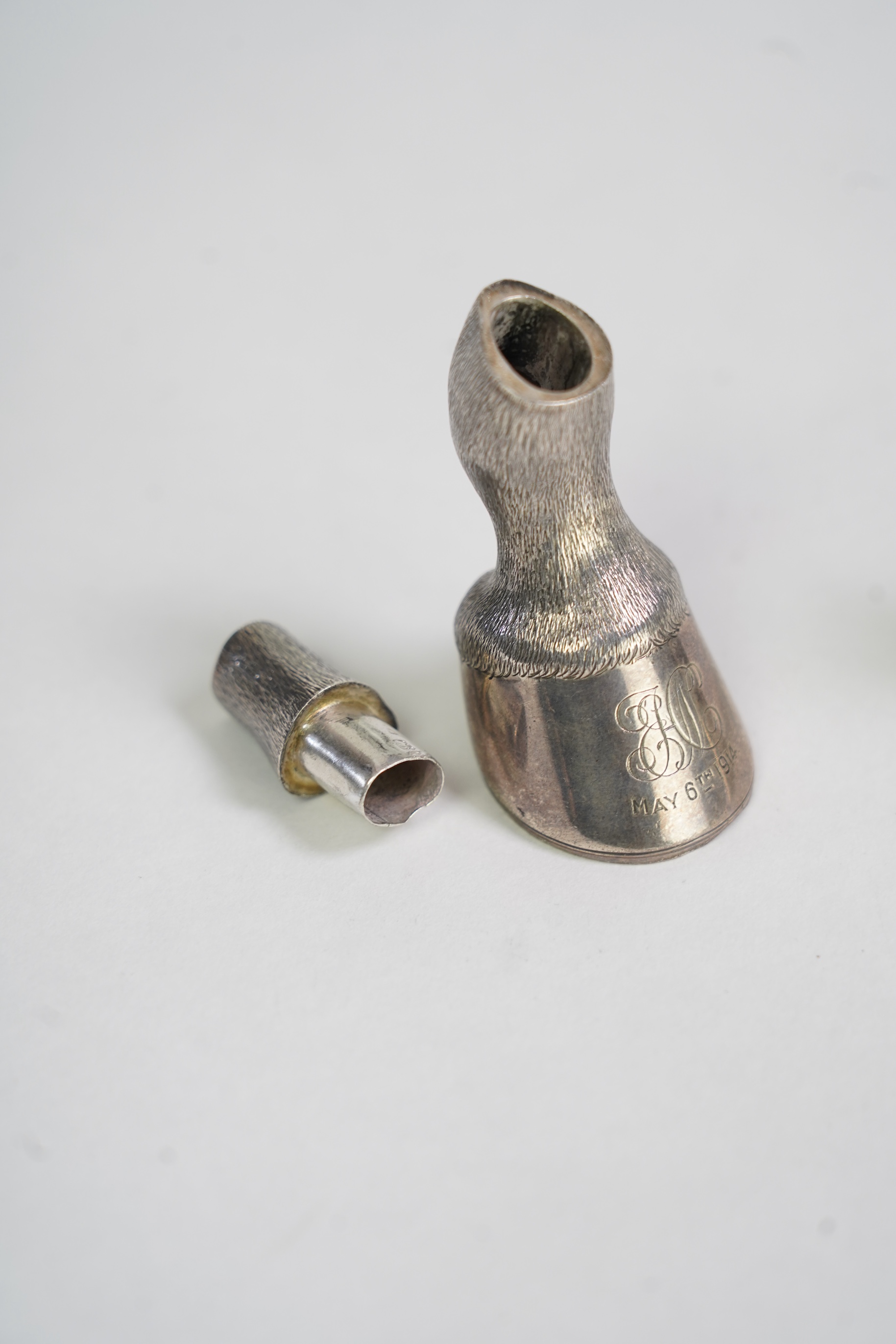 A pair of Edwardian novelty silver condiments modelled and a horse's fetlock and hoof, makers mark rubbed